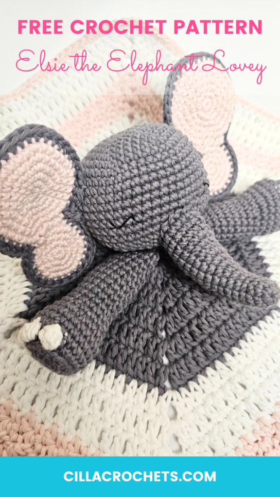 Pin this free crochet elephant lovey pattern for later. An image for pinterest with the words 'Free Crochet Pattern - Elsie the Elephant' across the top, and a picture of an adorable crocheted elephant lovey in grey, pink, and white yarn.